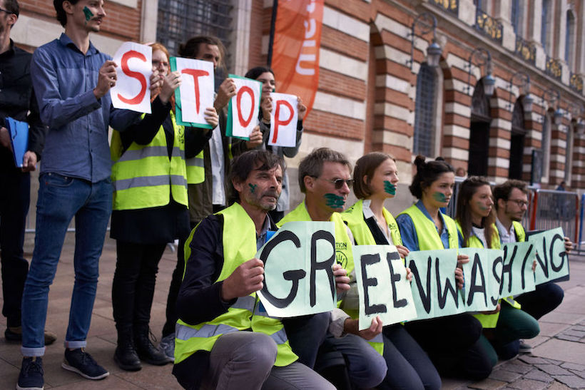 Members of ANC-COP21 staged a protest in front of the townhall of Toulouse
