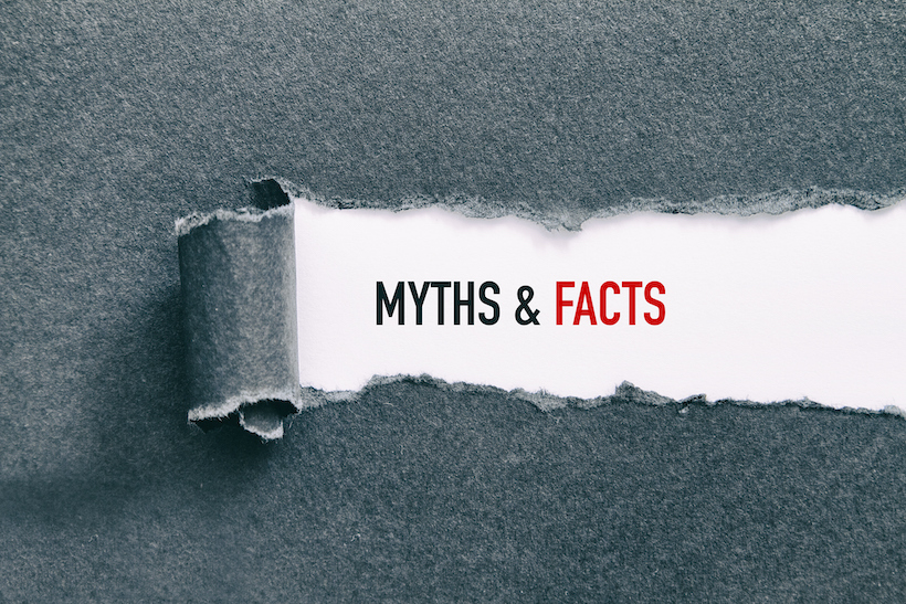 The words "myths and facts" written under torn paper.