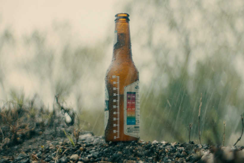 Nativa beer bottle with rain gauge printed on outsite