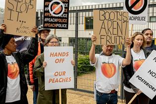 People protesting with signs about peaches
